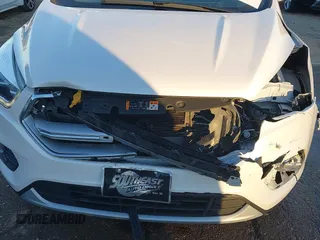 2017 Ford Escape Titanium with VIN 1FMCU0J98HUA75690, listed as a IAAI auction lot 41358534 with 90,376 mi miles. Bid and sale history available at carsss.com. Image 6.