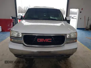 2004 GMC Yukon SLE z VIN 1GKEC13V64R107506, wystawiony jako IAAI lot #41407353 z przebiegiem 215 127 mil mil oraz . Historia ofert i sprzedaży dostępna na DreamBid. Obrazek 12.