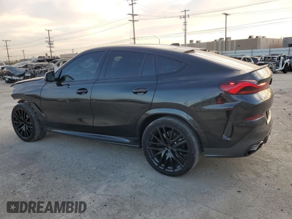 2024 BMW X6 xDrive40i with VIN 5UX33EX02R9U49162, listed as a Copart auction lot 85107534 with 14,888 mi miles and Salvage Title. Bid and sale history available at carsss.com. Image 2.