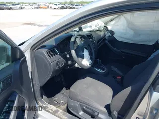 2014 Volkswagen Jetta Sedan S with VIN 3VW2K7AJ3EM310020, listed as a IAAI auction lot 41338164 with 76,456 mi miles. Bid and sale history available at carsss.com. Image 5.