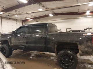 2014 Chevrolet Silverado 1500 LT with VIN 3GCUKRECXEG503427, listed as a IAAI auction lot 41526582 with 130,070 mi miles and . Bid and sale history available at DreamBid. Image 14.