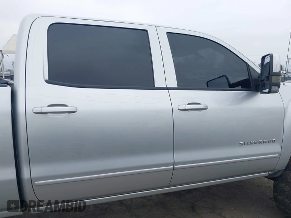 2015 Chevrolet Silverado 1500 LT with VIN 1GCUKREC7FF198486, listed as a IAAI auction lot 42131232 with 151,947 mi miles and . Bid and sale history available at DreamBid. Image 13.