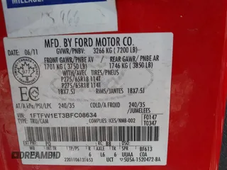 2011 Ford F-150 XLT with VIN 1FTFW1ET3BFC08634, listed as a IAAI auction lot 41452275 with 219,800 mi miles. Bid and sale history available at carsss.com. Image 9.
