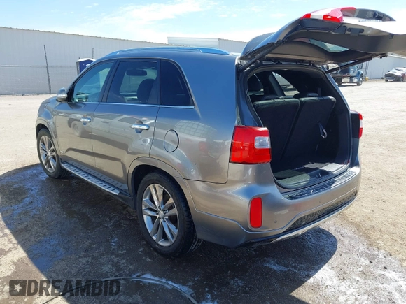 2015 Kia Sorento SX with VIN 5XYKWDA74FG591902, listed as a IAAI auction lot 41856991 with 128,471 mi miles. Bid and sale history available at carsss.com. Image 3.