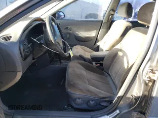 2003 Kia Spectra with VIN KNAFB121935265035, listed as a Copart auction lot 86407934 with 201,586 mi miles and Salvage Title. Bid and sale history available at DreamBid. Image 7.