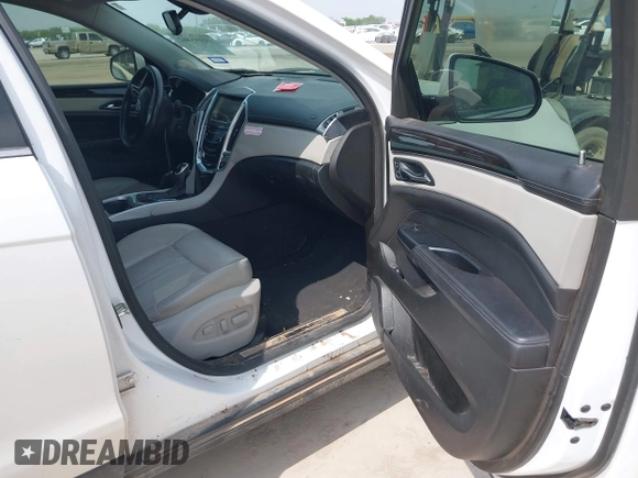 2013 Cadillac SRX Performance Collection с VIN 3GYFNDE30DS648288, выставлен на аукционе IAAI как лот 41955462 с пробегом 135 956 миль миль и . История ставок и продаж доступна на DreamBid. Изображение 5.