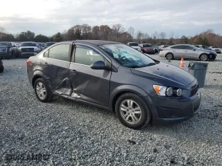 2012 Chevrolet Sonic LT with VIN 1G1JC5SB6C4192067, listed as a Copart auction lot 82719114 with 138,346 mi miles and Salvage Title. Bid and sale history available at carsss.com. Image 4.