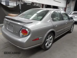 2002 Nissan Maxima GLE with VIN JN1DA31D32T422365, listed as a IAAI auction lot 41644137 with 165,157 mi miles and . Bid and sale history available at DreamBid. Image 4.