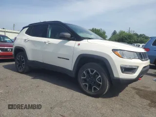 2019 Jeep Compass Trailhawk with VIN 3C4NJDDB5KT647778, listed as a Copart auction lot 62032515 with 51,505 mi miles and Salvage title. Bid and sale history available at DreamBid. Image 4.