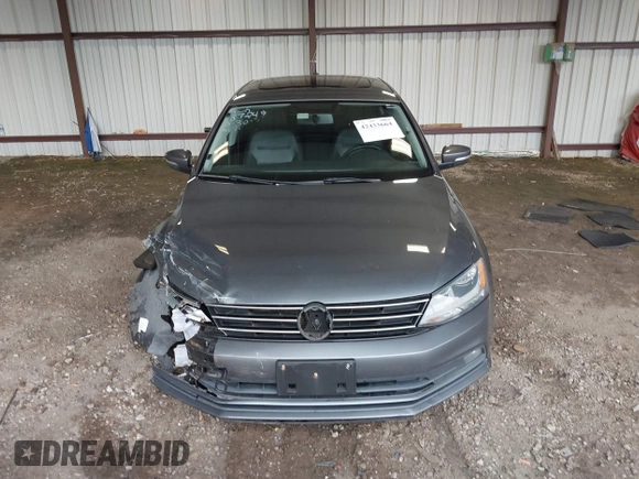 2015 Volkswagen Jetta SE with VIN 3VWD07AJ9FM310300, listed as a IAAI auction lot 42433664 with 117,579 mi miles and . Bid and sale history available at DreamBid. Image 12.