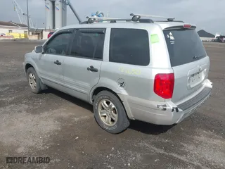 2005 Honda Pilot EX with VIN 2HKYF184X5H533837, listed as a IAAI auction lot 41900265 with 163,522 mi miles. Bid and sale history available at carsss.com. Image 3.
