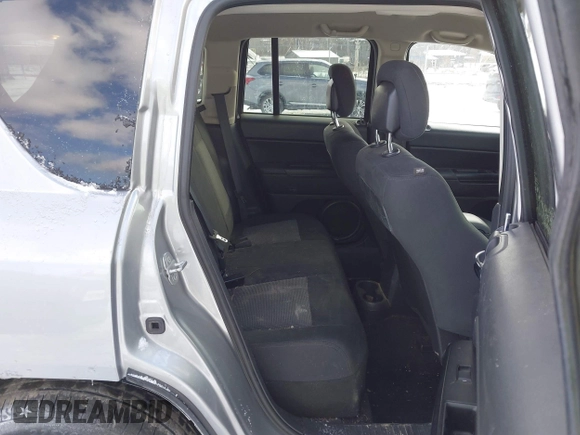 2015 Jeep Compass Sport with VIN 1C4NJDBB1FD206616, listed as a IAAI auction lot 41595052 with 112,836 mi miles. Bid and sale history available at carsss.com. Image 8.