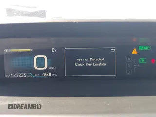 2020 Toyota Prius L Eco z VIN JTDKARFU6L3104385, wystawiony jako IAAI lot #41922029 z przebiegiem 123 235 mil mil oraz . Historia ofert i sprzedaży dostępna na DreamBid. Obrazek 7.