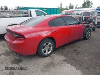 2015 Dodge Charger SE z VIN 2C3CDXBGXFH870710, wystawiony jako IAAI lot #42291111 z przebiegiem 119 677 mil mil oraz . Historia ofert i sprzedaży dostępna na DreamBid. Obrazek 4.