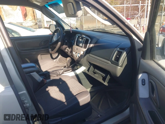 2006 Mazda Tribute i with VIN 4F2YZ92Z66KM10050, listed as a IAAI auction lot 41346153 with 139,668 mi miles and . Bid and sale history available at carsss.com. Image 5.