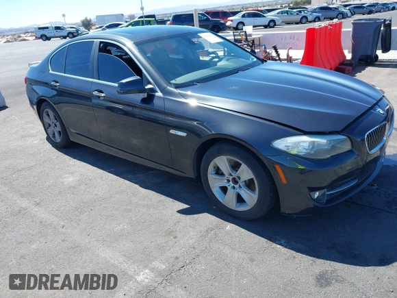 2013 BMW 5 Series 528i with VIN WBAXG5C58DD232582, listed as a IAAI auction lot 41890082 with 150,401 mi miles and . Bid and sale history available at carsss.com. Image 1.