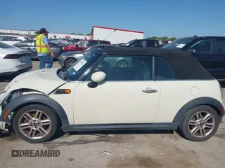 2013 MINI Convertible with VIN WMWZN3C58DT568824, listed as a IAAI auction lot 41998124 with 134,191 mi miles and . Bid and sale history available at DreamBid. Image 14.