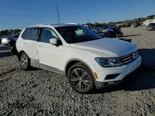 2018 Volkswagen Tiguan SEL z VIN 3VV3B7AX3JM047891, wystawiony jako Copart lot #41615545 z przebiegiem 63 995 mil mil oraz Szkoda całkowita • Salvage title. Historia ofert i sprzedaży dostępna na DreamBid. Obrazek 11.