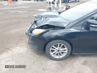 2017 Ford Focus SE with VIN 1FADP3F25HL239809, listed as a IAAI auction lot 42163669 with 140,220 mi miles and . Bid and sale history available at DreamBid. Image 12.