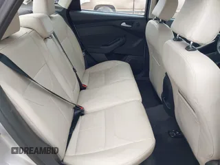 2017 Ford Focus Titanium with VIN 1FADP3J24HL229702, listed as a IAAI auction lot 42057013 with 120,250 mi miles and . Bid and sale history available at DreamBid. Image 8.