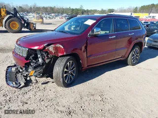 2017 Jeep Grand Cherokee Overland with VIN 1C4RJECG7HC823478, listed as a IAAI auction lot 41367186 with 82,873 mi miles. Bid and sale history available at carsss.com. Image 2.