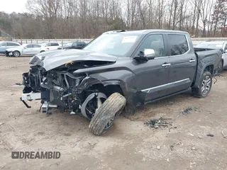 2024 Toyota Tundra 1794 Edition with VIN 5TFMA5DBXRX142402, listed as a IAAI auction lot 41253806 with 17,523 mi miles and . Bid and sale history available at DreamBid. Image 2.