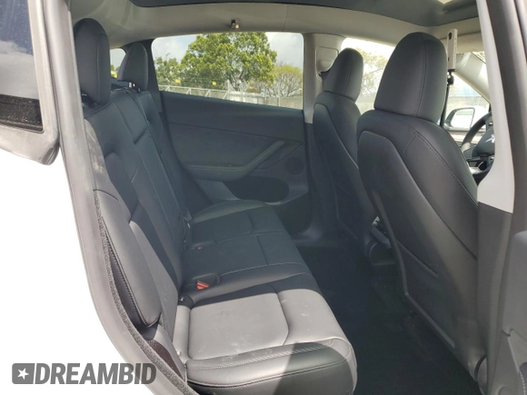 2024 Tesla Model Y z VIN 7SAYGDED4RF054565, wystawiony jako Copart lot #51188065 z przebiegiem 10 540 mil mil oraz Szkoda całkowita • Salvage title. Historia ofert i sprzedaży dostępna na DreamBid. Obrazek 11.