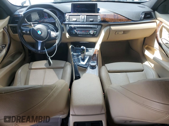 2014 BMW 3 Series 320i xDrive with VIN WBA3C3C53EK200375, listed as a Copart auction lot 59915595 with 104,320 mi miles and Salvage title. Bid and sale history available at DreamBid. Image 8.