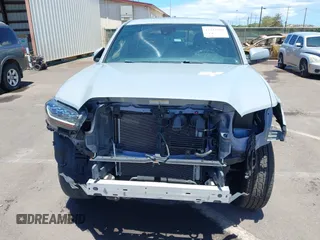 2019 Toyota Tacoma SR with VIN 3TMCZ5AN7KM213537, listed as a IAAI auction lot 42442068 with 39,969 mi miles and . Bid and sale history available at DreamBid. Image 6.