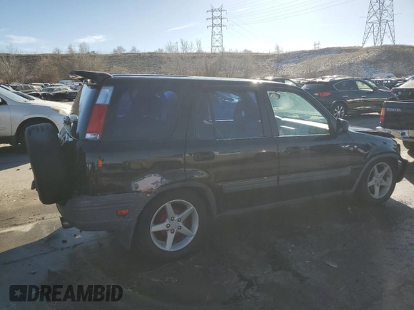 2001 Honda CR-V LX with VIN JHLRD17431S012565, listed as a Copart auction lot 84760154 with 197,788 mi miles and Salvage Title. Bid and sale history available at carsss.com. Image 3.