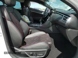 2023 Genesis G70 3.3T with VIN KMTG54TEXPU105082, listed as a Copart auction lot 65000724 with 12,941 mi miles and Salvage Title. Bid and sale history available at carsss.com. Image 7.