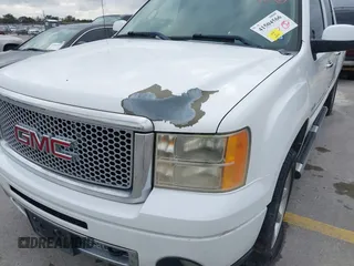 2011 GMC Sierra 1500 Denali z VIN 3GTP2XE25BG404518, wystawiony jako IAAI lot #41504566 z przebiegiem 187 926 mil mil oraz . Historia ofert i sprzedaży dostępna na DreamBid. Obrazek 6.