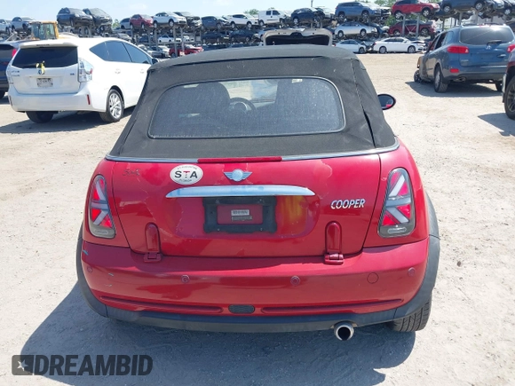 2006 MINI Convertible with VIN WMWRF33556TG14466, listed as a IAAI auction lot 42096368 with 120,230 mi miles and . Bid and sale history available at DreamBid. Image 17.