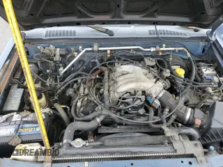 2000 Nissan Frontier XE with VIN 1N6ED27T3YC343320, listed as a Copart auction lot 64883025 with 168,047 mi miles and Clean title. Bid and sale history available at DreamBid. Image 11.