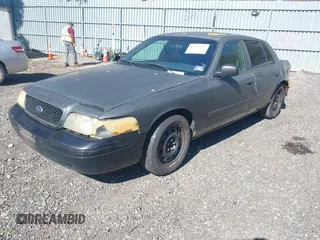 2011 Ford Crown Victoria with VIN 2FABP7AV9BX121739, listed as a IAAI auction lot 41763311 with 215,727 mi miles. Bid and sale history available at carsss.com. Image 17.
