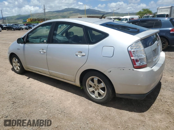 2006 Toyota Prius with VIN JTDKB22U167521985, listed as a Copart auction lot 54974335 with 128,541 mi miles and Clean Title. Bid and sale history available at carsss.com. Image 2.