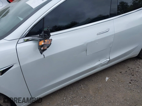 2020 Tesla Model 3 Long Range with VIN 5YJ3E1EB0LF703733, listed as a IAAI auction lot 41796732 with 75,027 mi miles. Bid and sale history available at carsss.com. Image 6.