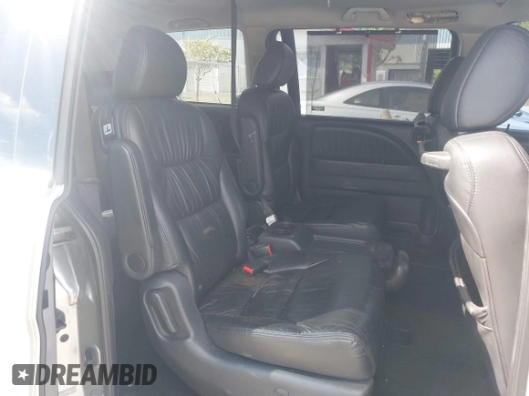 2009 Honda Odyssey Touring с VIN 5FNRL38969B013708, выставлен на аукционе IAAI как лот 42002538 с пробегом 198 220 миль миль и . История ставок и продаж доступна на DreamBid. Изображение 8.