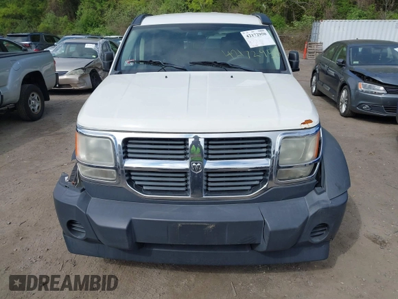 2007 Dodge Nitro SXT z VIN 1D8GU28K87W652037, wystawiony jako IAAI lot #42172950 z przebiegiem 172 487 mil mil oraz . Historia ofert i sprzedaży dostępna na DreamBid. Obrazek 12.