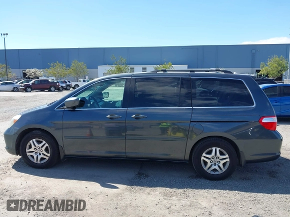 2005 Honda Odyssey TOURING with VIN 5FNRL38885B082482, listed as a IAAI auction lot 41879897 with 159,667 mi miles. Bid and sale history available at carsss.com. Image 14.