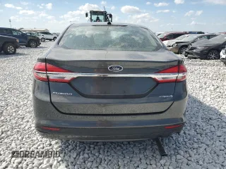2018 Ford Fusion Hybrid S with VIN 3FA6P0UU8JR145166, listed as a Copart auction lot 71016294 with 54,817 mi miles and Salvage Title. Bid and sale history available at carsss.com. Image 6.