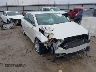2012 Buick LaCrosse Premium 3 z VIN 1G4GH5G36CF331439, wystawiony jako IAAI lot #41469675 z przebiegiem 165 934 mil mil oraz . Historia ofert i sprzedaży dostępna na DreamBid. Obrazek 1.