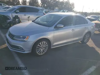 2015 Volkswagen Jetta Sport z VIN 3VWD17AJ5FM220946, wystawiony jako IAAI lot #41384898 z przebiegiem 164 172 mil mil oraz . Historia ofert i sprzedaży dostępna na DreamBid. Obrazek 2.