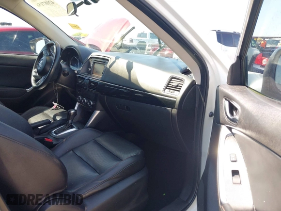 2015 Mazda CX-5 Grand Touring with VIN JM3KE2DYXF0493370, listed as a IAAI auction lot 42087156 with 161,464 mi miles. Bid and sale history available at carsss.com. Image 5.