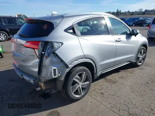 2021 Honda HR-V EX with VIN 3CZRU6H59MM749892, listed as a IAAI auction lot 41550074 with 61,590 mi miles. Bid and sale history available at carsss.com. Image 4.