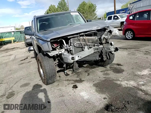 2008 Jeep Commander Sport with VIN 1J8HG48K18C184699, listed as a Copart auction lot 54739305 with 185,950 mi miles and Salvage title. Bid and sale history available at DreamBid. Image 12.