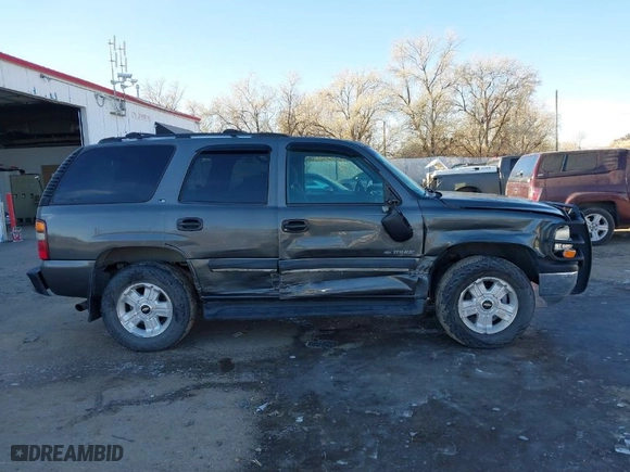 2002 Chevrolet Tahoe LS with VIN 1GNEK13V82J180328, listed as a IAAI auction lot 40810285 with 210,728 mi miles. Bid and sale history available at carsss.com. Image 13.