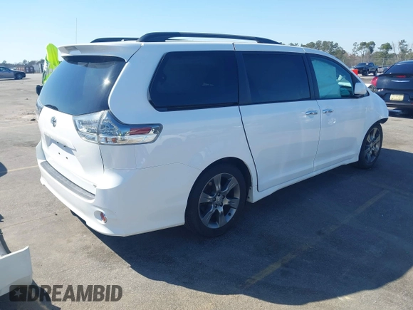 2015 Toyota Sienna SE with VIN 5TDXK3DC4FS566084, listed as a IAAI auction lot 41777561 with 153,002 mi miles and . Bid and sale history available at carsss.com. Image 4.