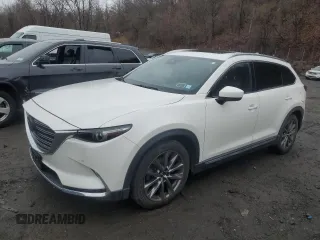 2020 Mazda CX-9 Signature with VIN JM3TCBEY8L0413570, listed as a Copart auction lot 83105304 with 66,765 mi miles and Salvage Title. Bid and sale history available at carsss.com. Image 1.