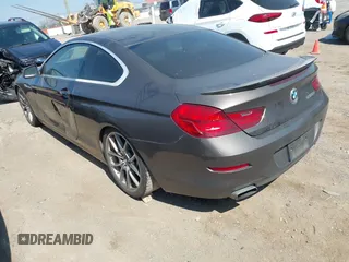 2012 BMW 6 Series 650i z VIN WBALX3C57CC528832, wystawiony jako IAAI lot #41779268 z przebiegiem 75 119 mil mil oraz . Historia ofert i sprzedaży dostępna na DreamBid. Obrazek 3.